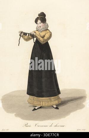Haarflechte, Paris, Anfang des 19. Jahrhunderts, in elisabethanischem Kragen, Bronzekleid, langer schwarzer Schürze, mit geflochtenem Brötchen und Locken. Sie hält eine Probe ihrer Arbeit auf. Tresseuse de cheveux. Handkolorierter Kupferstich von Georges Jacques Gatine nach einer Illustration von Louis-Marie Lante aus Ouvrieres de Paris, Paris, 1823. Stockfoto