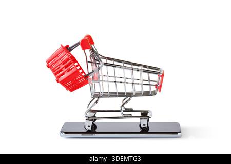 Warenkorb mit Warenkorb auf Handy - Konzept des E-Commerce und Online-Shopping Stockfoto