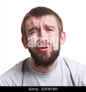 Trauriger Mann mit unglücklichem Gesichtsausdruck, Nahaufnahme Stockfoto