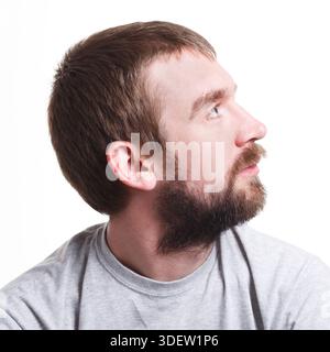 Verloren in Gedanken, Seitenansicht eines Menschen mit nachdenklichem, nachdenklichem Gesicht Stockfoto