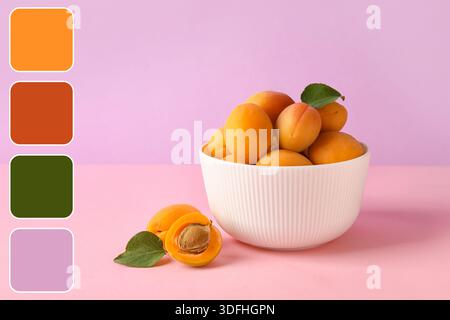Schüssel mit köstlichen Aprikosen auf rosa Hintergrund Stockfoto