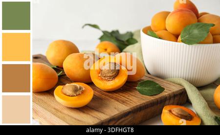 Brett mit Reifen Aprikosen auf hellem Hintergrund, Nahaufnahme. Verschiedene Farbmuster Stockfoto