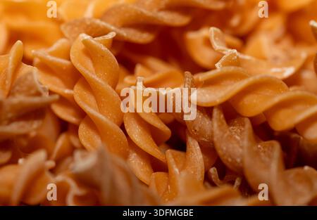 Getrocknete rohe Teigwaren aus nächster Nähe Hintergrund Stockfoto