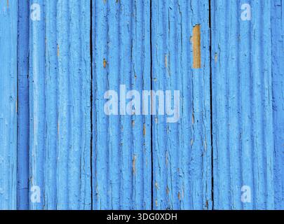 Alten rauhen Holzbrettern mit Rissen als Hintergrund. Holzbohlen Textur mit dem schäbigen blauen Farbe Stockfoto