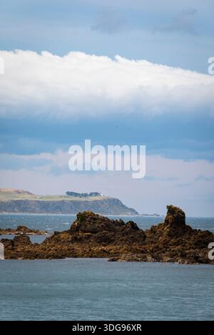 Baring Head und Leuchtturm von Houghton Bay, Wellington, Nordinsel, Neuseeland Stockfoto
