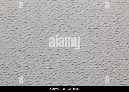 Makroaufnahme von schwerem Papier mit ausgeprägtem geprägtem Relief. Sauberer, weißer, strukturierter Hintergrund für digitale Malerei, Kalligraphie, Scrapbooking Stockfoto