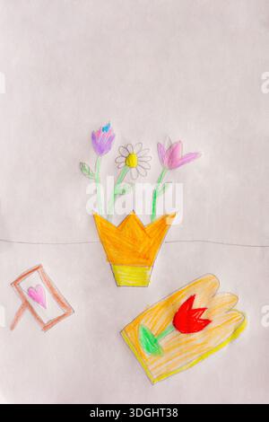 Blumen in einem Topf mit Herz Bild Stockfoto