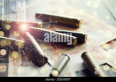 Kugeln liegen auf der Geldspitze Stockfoto