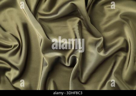 Textur des Olivenstoffes als Hintergrund, Draufsicht Stockfoto