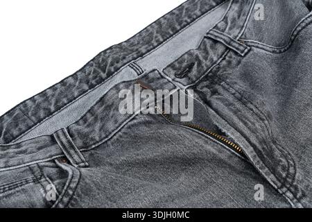 Detail einer grauen Jeans auf transparenter Oberfläche Stockfoto