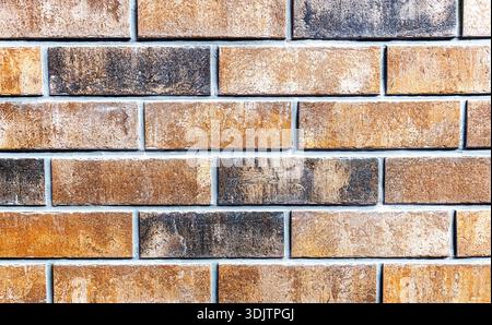Ziegelwand als kreative Hintergrundstruktur aus nächster Nähe Stockfoto