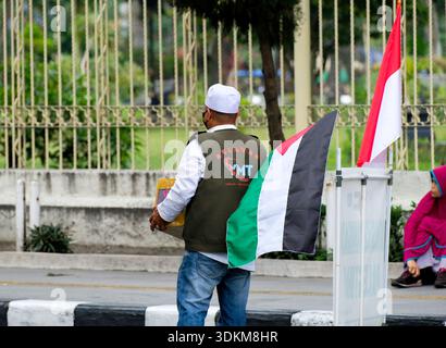 Pekanbaru, Indonesien - 28. September 2025: Humanitäre Organisation sammelt am autofreien Tag Gelder für Palästina Stockfoto