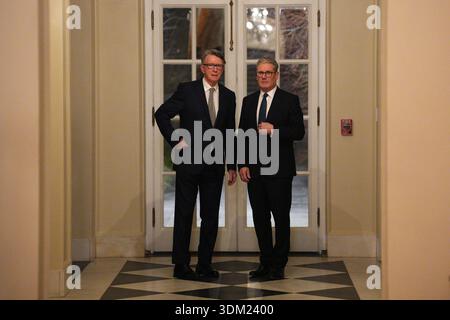 File photo dated 27/02/25 of Prime Minister Sir Keir Starmer (right) and the then British ambassador to the United States Peter Mandelson during a welcome reception at the ambassador's residence in Washington, DC. Prime Minister Sir Keir Starmer told Cabinet Lord Peter Mandelson had "let his country down" and there is a need to "move at pace" in responding to the revelations in the Jeffrey Epstein files, Downing Street said. Issue date: Tuesday February 03, 2026. Stockfoto