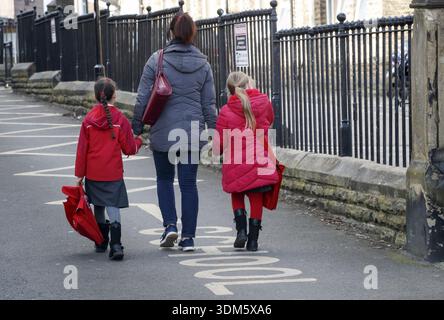 File photo dated 13/03/20 of children leaving a school. Rules on fostering could be changed to ensure single or unmarried people, renters and those in full-time work can open their homes to children in need of care across England, under new proposals. Issue date: Wednesday February 4, 2026. Stockfoto