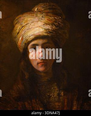 Junger Mann in einem Turban von Follower of Rembrandt van Rijn, um 1650, Porträt eines bärtigen Mannes, der einen kunstvoll gewickelten Kopfschmuck und dunkle Kleidung vor einem schattigen Hintergrund trägt Stockfoto