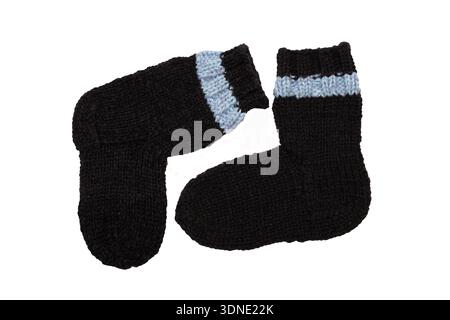 Strickwolle, handgemachte Socken auf weißem Hintergrund Stockfoto