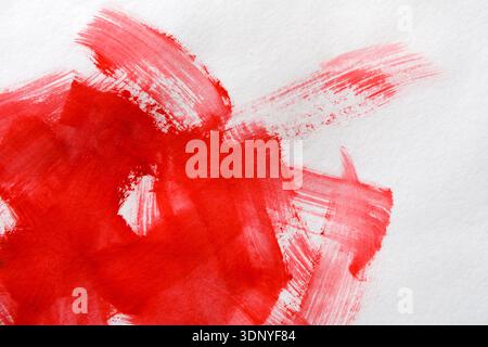 Pinselstriche mit Aquarellfarben auf Papierstruktur Stockfoto
