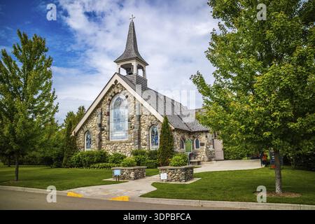 Mackinac Island, MI, USA - 23. Juni 2018: Die wunderschöne kleine steinerne Kirche Stockfoto