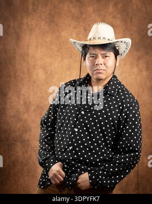 Cowboy im formellen Studio Stockfoto