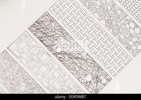 Collage von Mustern mit verschiedenen Designs und Texturen auf weißem Hintergrund für die künstlerische Überprüfung Stockfoto