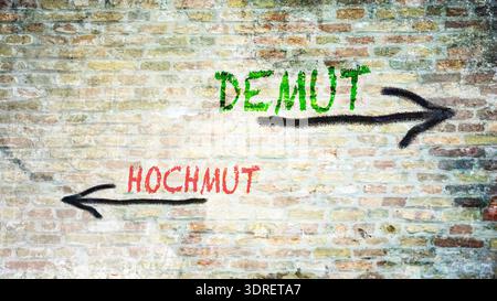 Wegweiser der direkte Weg zu Demut versus Hochmut - Bildmontage Stockfoto