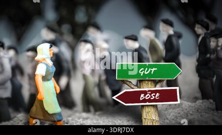 Wegweiser für den direkten Weg zu gut gegen Böse Stockfoto