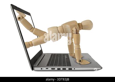 Mann Krabbelt Aus Dem Bildschirm Des Computer-Notebooks. Internet-Diebstahl-Konzept Stockfoto