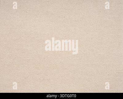 Beige Vintage Leinen Leinwandstruktur. Gefärbtes, schmutziges und verzweifeltes Material für die Herstellung von Kunstwerken, Malerei, Designs Dekoration, Hintergrundkonzepte Stockfoto