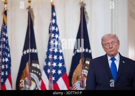 Washington, United States. 23rd Feb, 2026. United States President Donald J Trump attends an Angel Families Remembrance Ceremony in the East Room of the White House in Washington, DC, USA, on Monday, February 23, 2026. President Trump is signing a proclamation honoring the families of those killed by undocumented immigrants. Credit: Aaron Schwartz/Pool via CNP Credit: Abaca Press/Alamy Live News Stockfoto