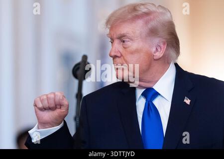 Washington, United States. 23rd Feb, 2026. President Donald Trump departs after an Angel Families Remembrance Ceremony in the East Room of the White House in Washington, DC on Monday, February 23, 2026. Trump signed a proclamation declaring February 22 as "Angel Family Day" to honor families who have lost loved ones to crimes committed by individuals in the country illegally or undocumented immigrants. Photo by Aaron Schwartz/UPI Credit: UPI/Alamy Live News Stockfoto