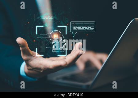Geschäftsmann, der KI-Chatbot auf Laptop für die Kommunikation verwendet. Konzept der generativen KI, des digitalen Assistenten und der intelligenten Technologie-Schnittstelle in der Wirtschaft. Stockfoto