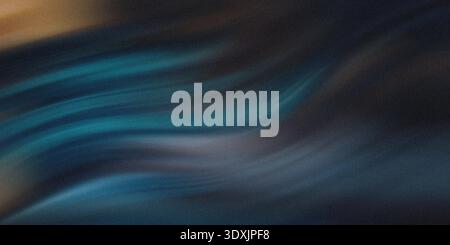 Ein abstraktes Bild mit verschwommenen Blau- und Schwarztönen, das einen dynamischen und ätherischen Effekt erzeugt Stockfoto