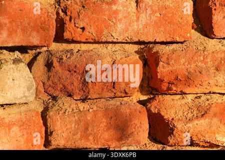 Hintergrund der Ziegelwand-Textur. Nahaufnahme der roten Ziegelmauer. Stockfoto