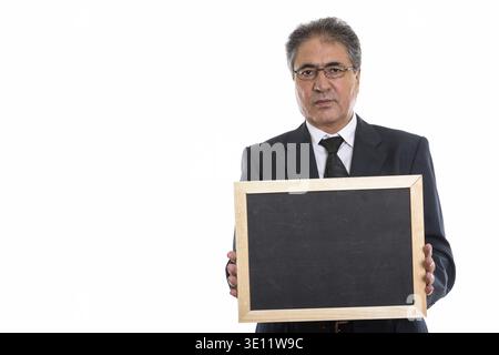 Studio shot der Persischen Kaufmanns Holding leere Tafel Stockfoto