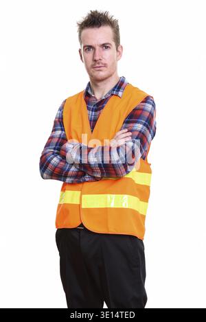 Studio-Aufnahme von Mann Bauarbeiter stehen mit gekreuzten Armen Stockfoto