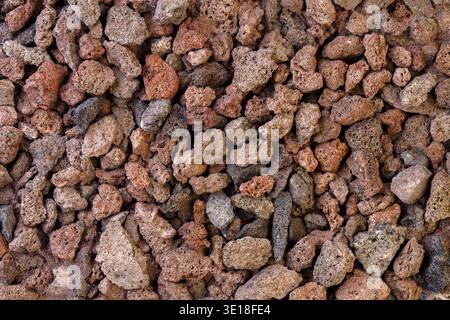 Textur aus vulkanischer Lava-Steinen. Stockfoto