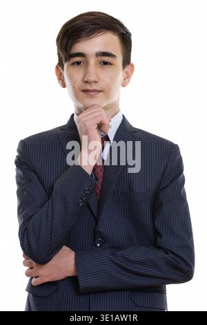 Studio-Aufnahme von jungen schönen persischen Teenager Geschäftsmann denken Stockfoto