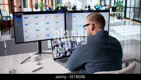 Marketing Manager Führt Online-Videokonferenz Über Laptop In Büroumgebung Durch Stockfoto
