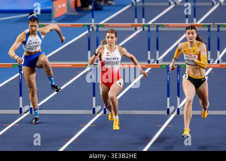 Anastasia Ntragkomirova (Griechenland 60), Adrianna Sulek-Schubert (Polen), Sandrina Sprengel (Deutschland) am 3. Tag der Leichtathletik-Hallenweltmeisterschaft Kujawy Pomorze 2026 in der Kujawsko Pomorska Arena Torun am 22. März 2026 in Torun (Polen). (Foto: Marcel ter Bals/MTB-Photo/Alamy Live News) Stockfoto