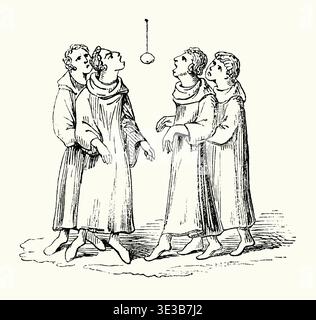 Eine alte Gravur von Mönchen, die im Mittelalter in England das Spiel von Schnappapfel (oder Apfel an einer Schnur) spielten. Bei dieser Variante des „Apfelwischens“ hängt der Apfel an einer Schnur von der Decke. Die Teilnehmer springen, um Bisse zu nehmen – der Gewinner ist der Spieler, der es schafft, zuerst seinen Apfel zu essen. Das alte Spiel des Apfelwischens (Wippen für Äpfel) wird gespielt, indem man eine Wanne oder ein großes Becken mit Wasser füllt und Äpfel ins Wasser legt. Die Äpfel schweben an der Oberfläche. Die Spieler versuchen dann, einen mit nur ihren Zähnen zu fangen. Stockfoto