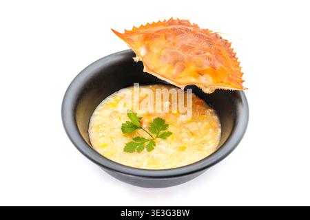 Asiatischer Reisbrei mit Krabben, cremiger Textur und Meeresfrüchtegeschmack Stockfoto