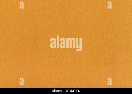 Nahaufnahme eines orange-braunen Texturpapierhintergrunds Stockfoto