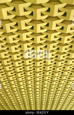 Hoher Winkel der metallisch-gelben Wand-3D-Musterfläche Stockfoto