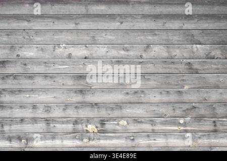 Rustikale Verkleidungsstruktur aus wiederverwertetem Holz mit horizontalen verwitterten Dielen. Stockfoto