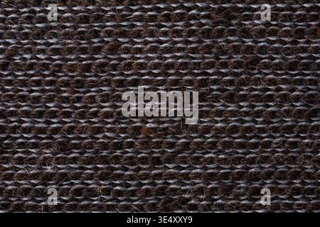 Dunkle Alpakawolle gestrickt Textil Makrostruktur Naturfaser Hintergrund Stockfoto
