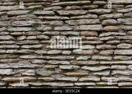 Alte Steinwand Textur mit natürlichem Muster, rustikaler Hintergrund für Design Stockfoto