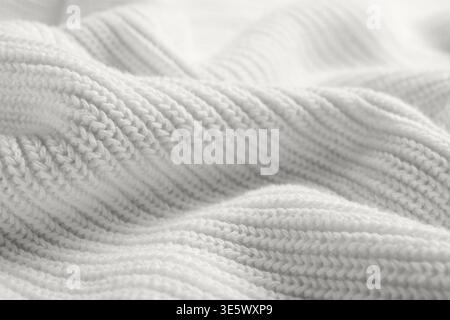 Textur aus zerknittert gestricktem Stoff als Hintergrund Stockfoto