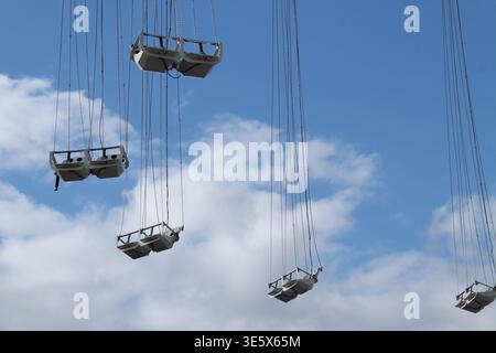 Die High Flying Sitze auf einer Schaukelfahrt. Stockfoto
