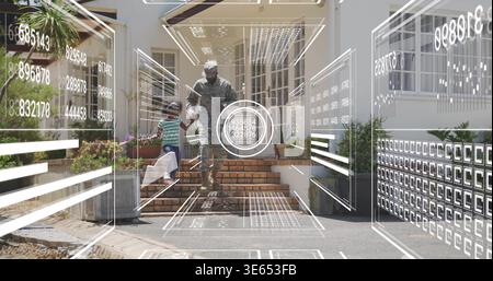 Ein mit Tarnung bekleideter, erwachsener Mann, der ein kleines Mädchen über die gemauerten Treppen auf der Veranda mit HUD-Überzügen führt Stockfoto