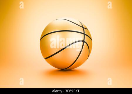 Goldener Basketballball mit schwarzen Streifen auf orangem Hintergrund Stockfoto
